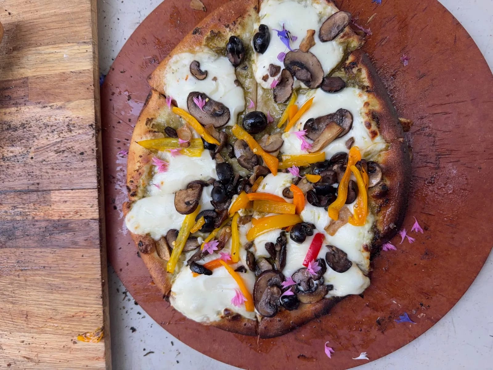 Wood-fired pizza with toppings
