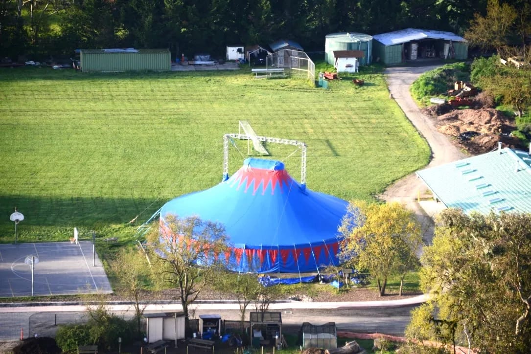 The Big Top pitched on the playing field, seen from above.