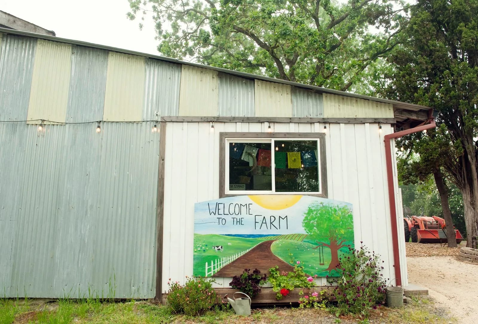 The hand-painted "Welcome to the Farm" sign at the farm stand.
