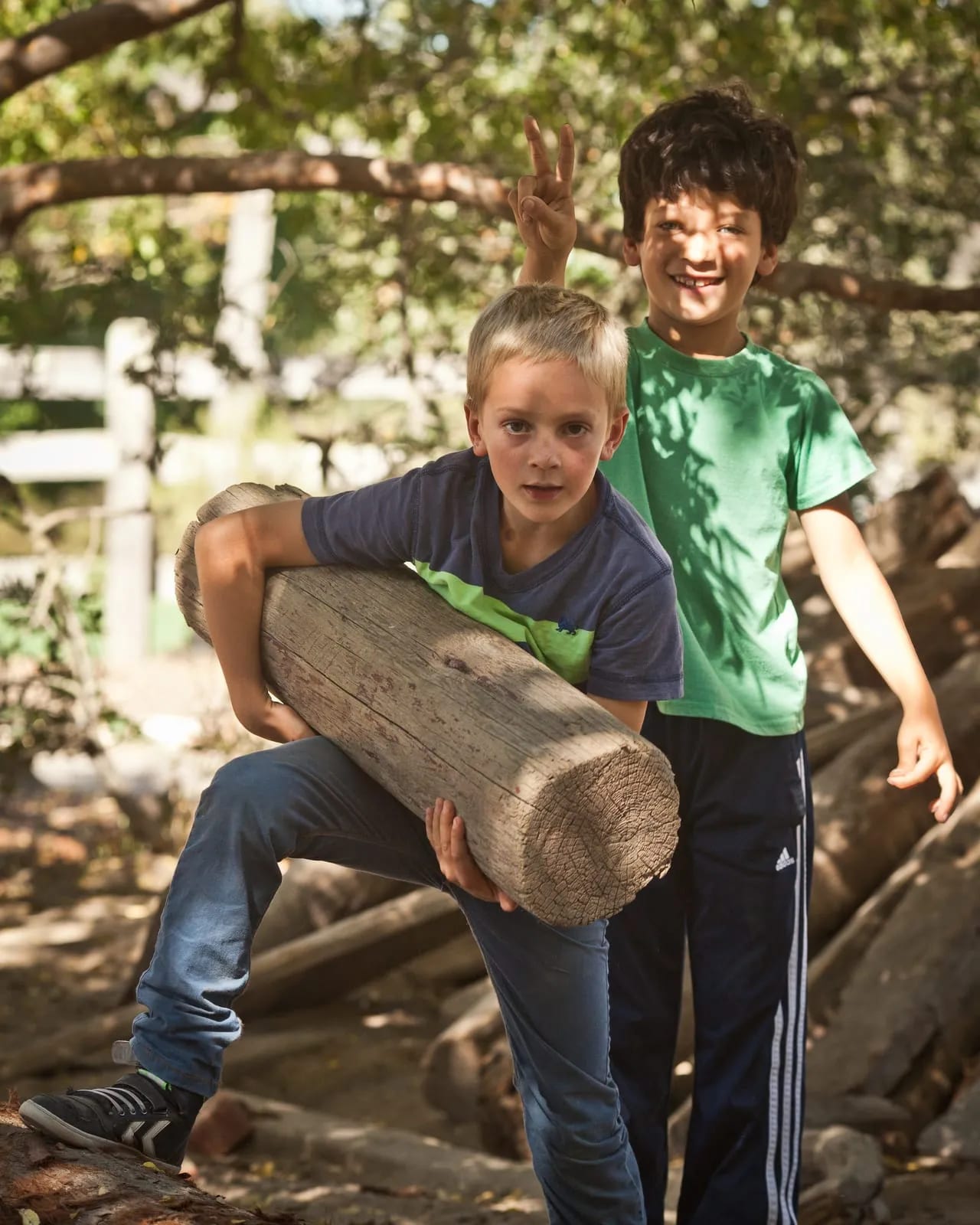 kindergarten boys playing in nature