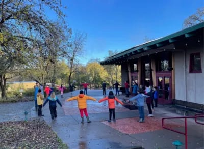 Morning circle, arms outstretched