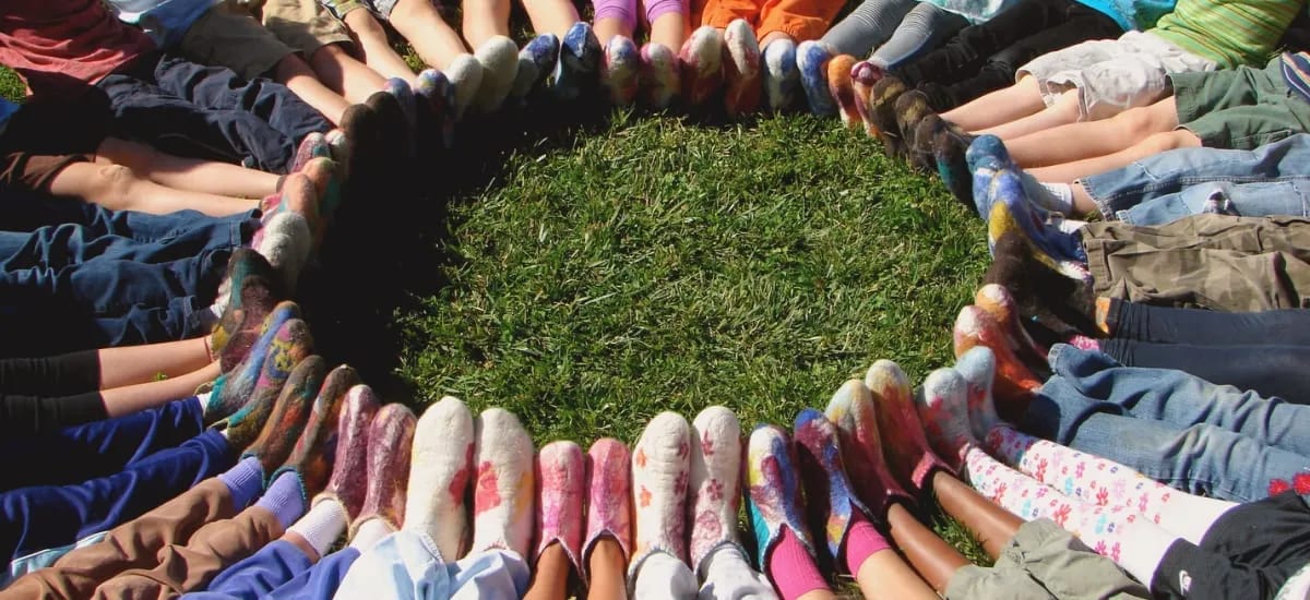 Children's feet forming circle